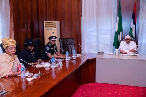 11757 Buhari with police and PSC member e1543254574255