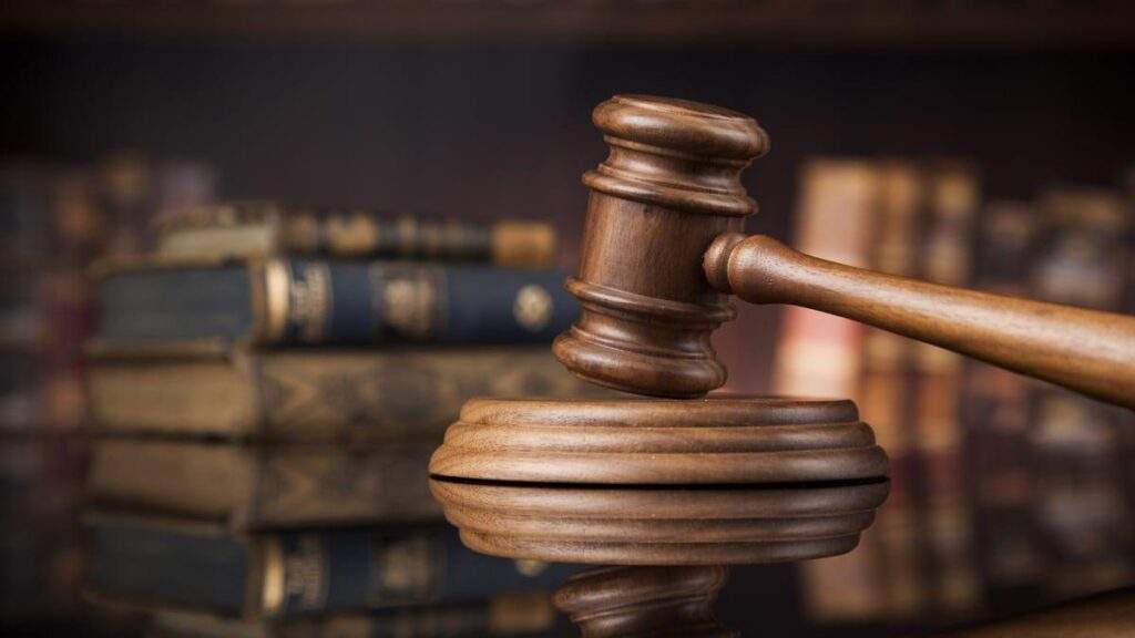 12235 court reinstates unlawfully dismissed immigration officer