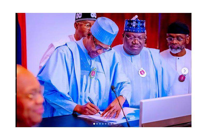 12237 Buhari signs 2023 budget