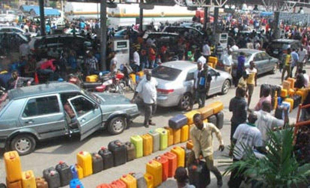 13296 fg blames fuel scarcity on cross border smugglers says over 1 6bn litres available