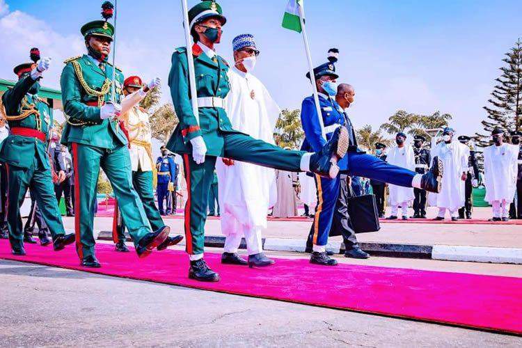 6821 buhari arrives national arcade for armed forces remembrance day