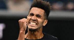 9997 nigerian born michael mmoh advances to australian open third round