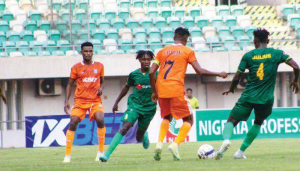 Action from the NPFL opener between Akwa United and Insurance in Uyo... on Sunday