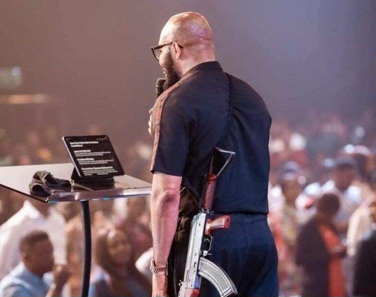 18713 police confirm arrest of abuja pastor who mounted pulpit with ak 47 owner of gun