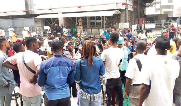20064 Some depositors at one of the CBN offices