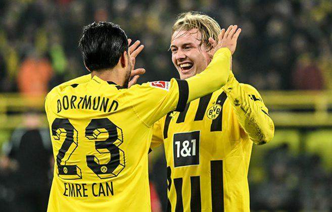 31462 dortmund put six past cologne to top bundesliga