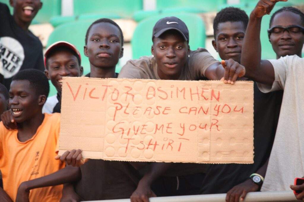 35931 2023 afconq excited guinea bissau fans beg for osimhens jersey