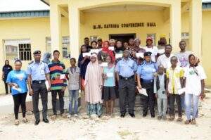 45771 police present n39 8m cheque to families of 25 deceased officers