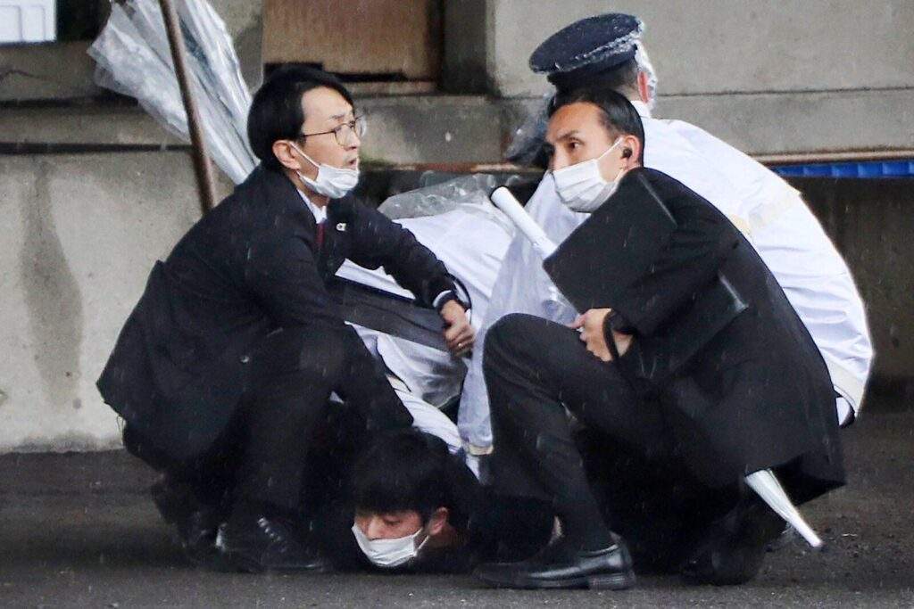 46250 japan pm safe after smoke bomb at speech report