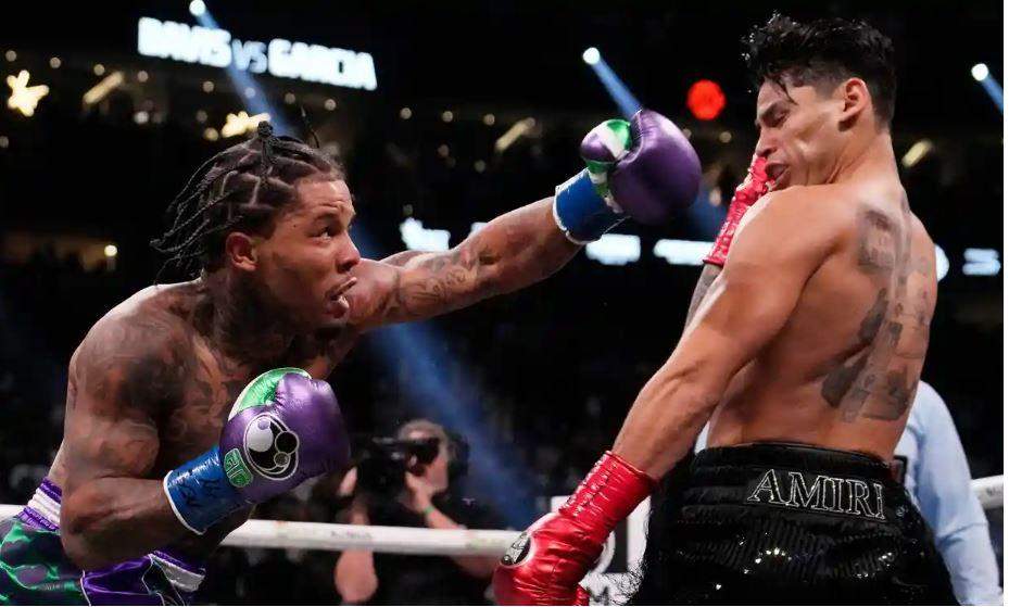 51301 davis knocks out garcia to remain unbeaten in marquee bout