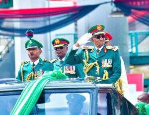 53118 pictorial buhari arrives army parade in military uniform