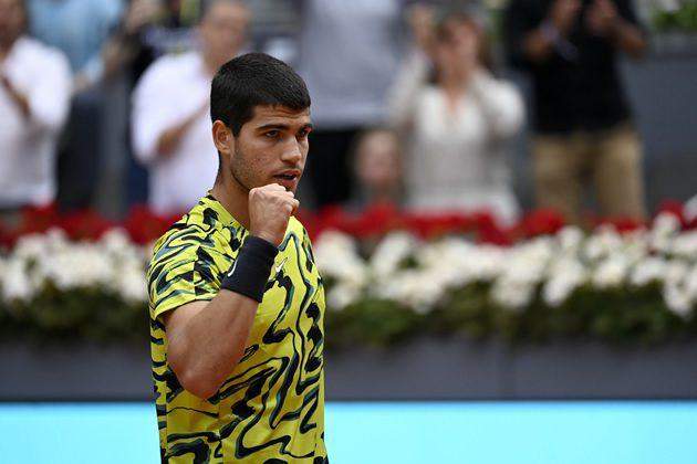54030 alcaraz survives madrid open scare