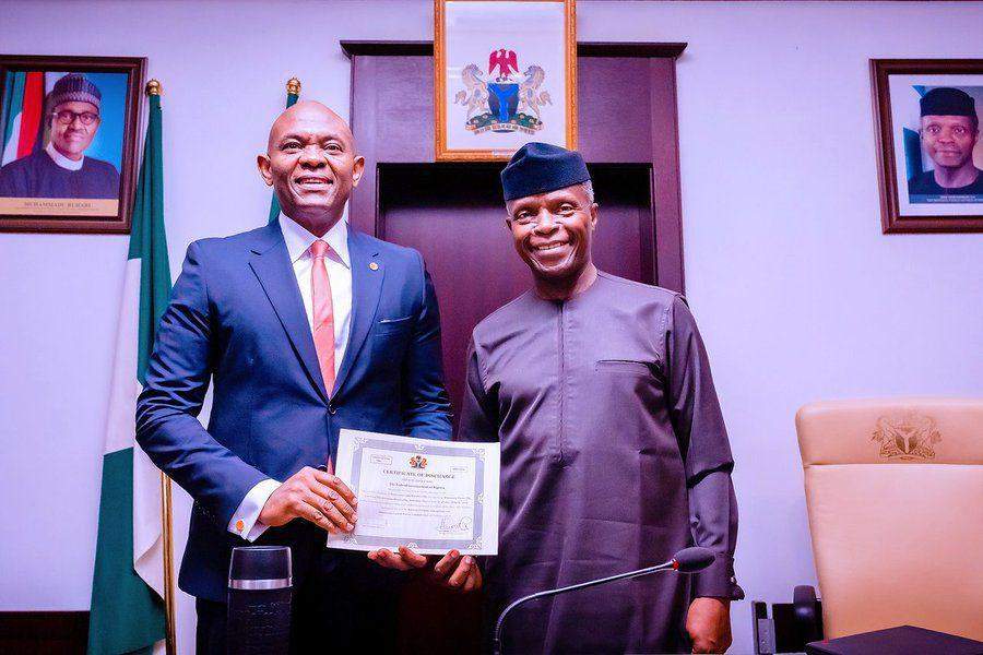 59128 osinbajo presents discharge certificate to transcorp