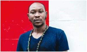 61566 seun kuti arrested for alleged assault manager claims police officer provoked him