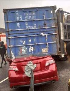 61622 driver miraculously survives as 40ft container crushes car in lagos
