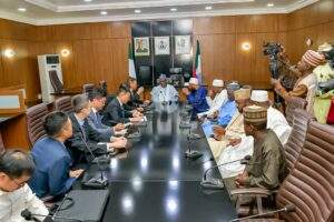 66394 nigeria cina holds talks to prevent litigation over illegal mining