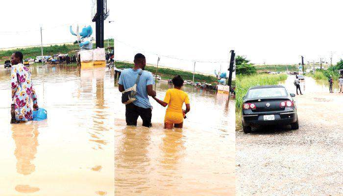 71739 ogun estate residents stranded as flood overruns link road