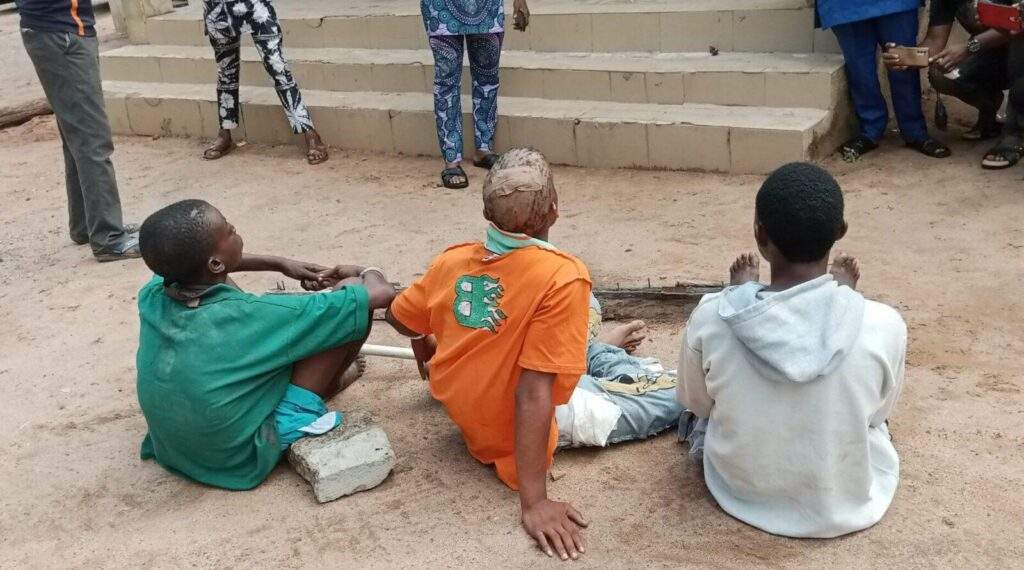 76649 police parade suspected killers of naval officer in ondo