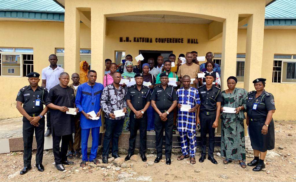 81324 families of deceased police officers accident victims receive n32 7m cheques in kogi