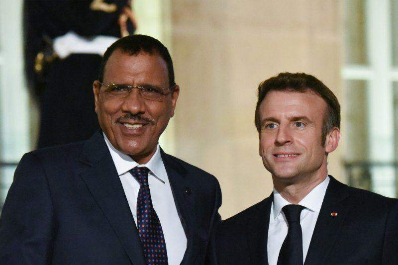 97408 niger coup french president urges restoration of democracy