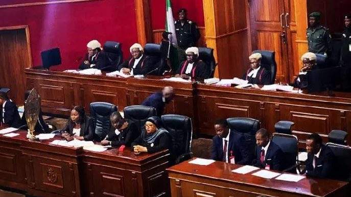 102432 tribunal affirms president tinubus election dismisses atiku obis petitions