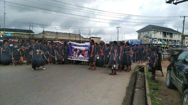 105850 confusion as black clad widows stage street protest in umuahia