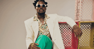 Symbolism of Asakes ASAKE Neck Tattoo and Other Ink Explained