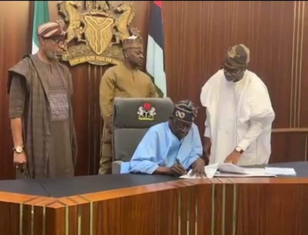 tinubu signs