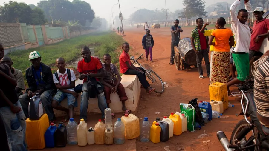 People queuing to buy fuel at a service station in Bangui Central African Republic