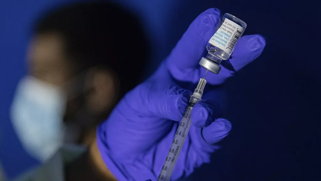 family nurse practitioner carol ramsubhag carela prepares a syringe with the mpox vaccine before inoculating a patient at a vaccinations site on tuesday aug 30 2022 ap