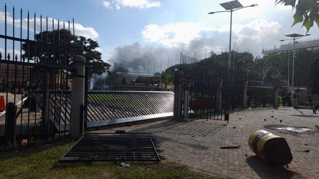 section of kenyan parliament on fire as protesters shot