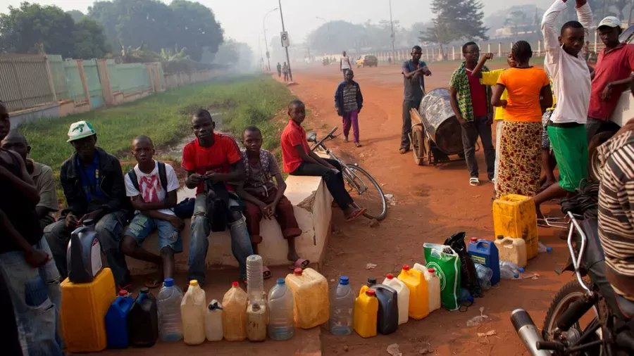 People queuing to buy fuel at a service station in Bangui Central African Republic
