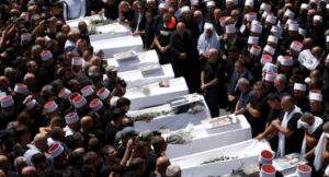 Israel Warns of "Heavy Price" as Rocket Fire Kills 12