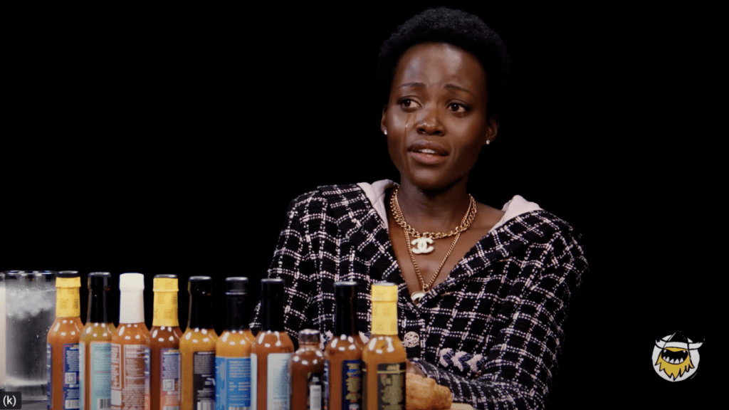 Lupita Nyong'o Burns as She Takes on Hot Ones Challenge