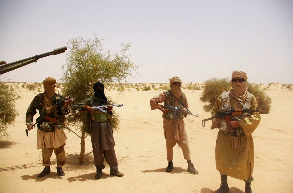 archive photo from 24 april 2012 fighters from the islamist group ansar dine stand guard