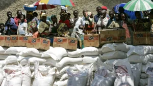 Displaced People Wait Their Turn To Receive Food Aid From The World Food Program 300x169