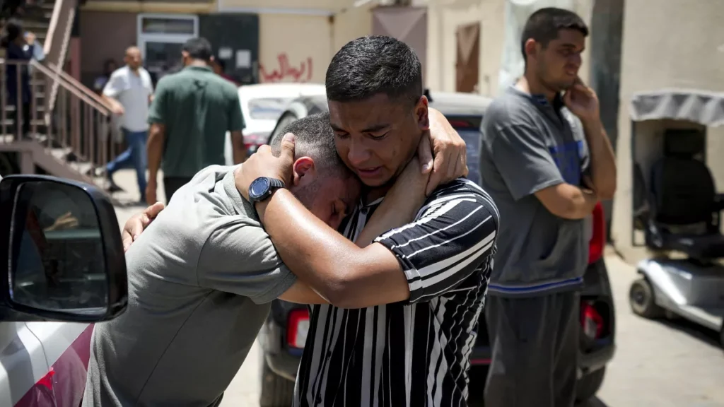 palestinians mourn relatives killed in the israeli bombardment of the gaza strip at a hospital morgue in deir al balah tuesday july 9 2024