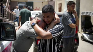palestinians mourn relatives killed in the israeli bombardment of the gaza strip at a hospital morgue in deir al balah tuesday july 9 2024
