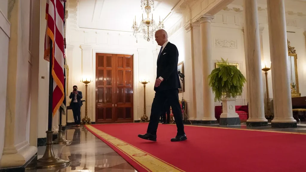 president joe biden walks from the podium after speaking in the cross hall of the white house on july 1 2024 in washington
