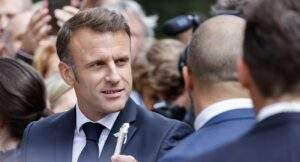 Macron Names New French Government Shifts to Right