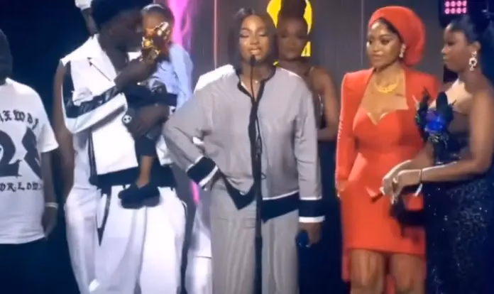Reactions as Mohbad’s widow, son receive singer’s posthumous award at 2025 Headies