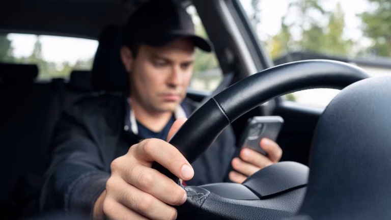 Distracted drivers text, read, and make social media content, survey says