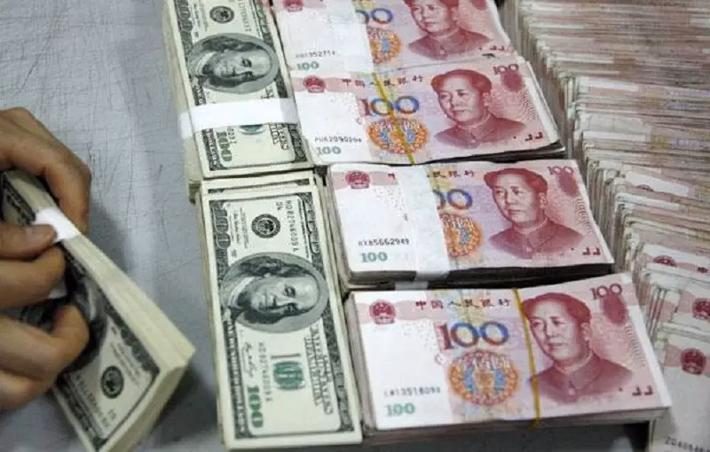 Yuan weakens to 7.2095 against dollar