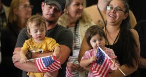 Afrikaner Refugees Arrive In US Amid Controversy Over Trumps Refugee 300x158