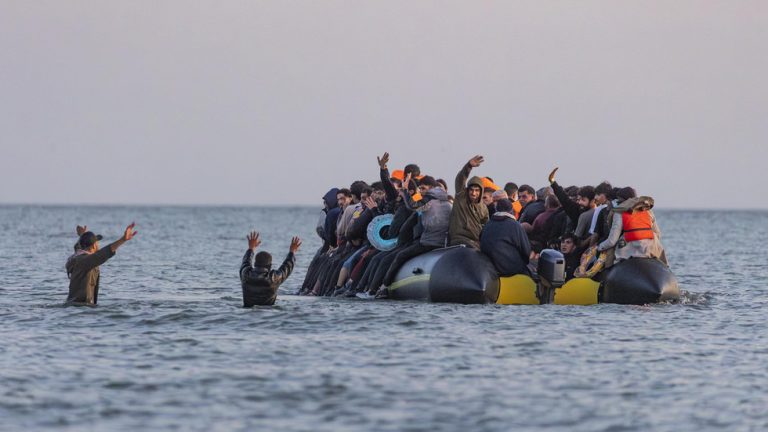 French police entering the sea with knives to tackle illegal migration — RT World News