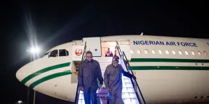 Tinubu arrives in Abuja after two-week state visits to Japan, Brazil