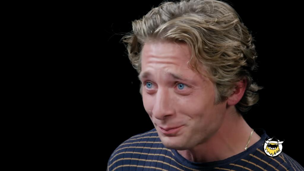 Jeremy Allen White tells restaurant stories while conquering Hot Ones