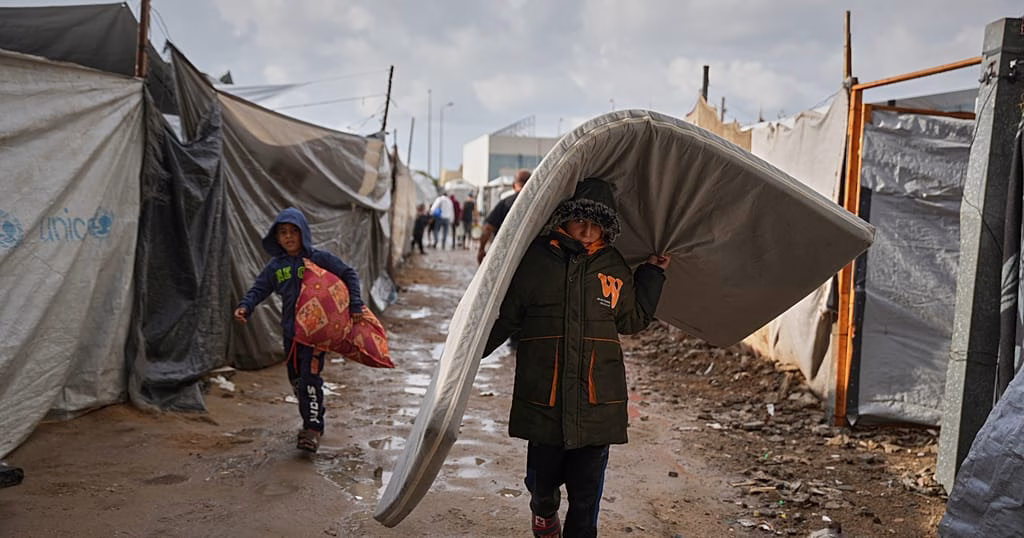 First strong winter rains soak Gaza's makeshift shelters