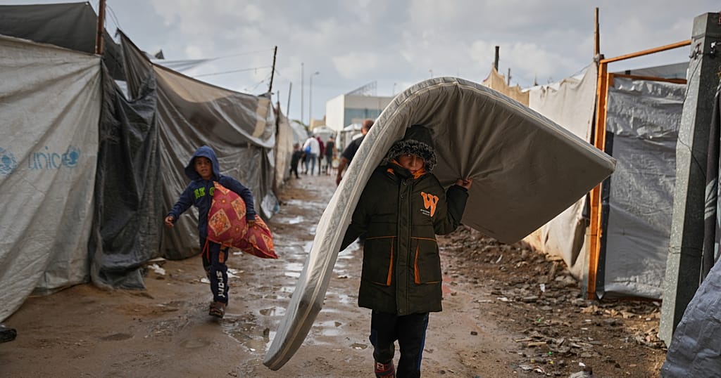 First strong winter rains soak Gaza's makeshift shelters