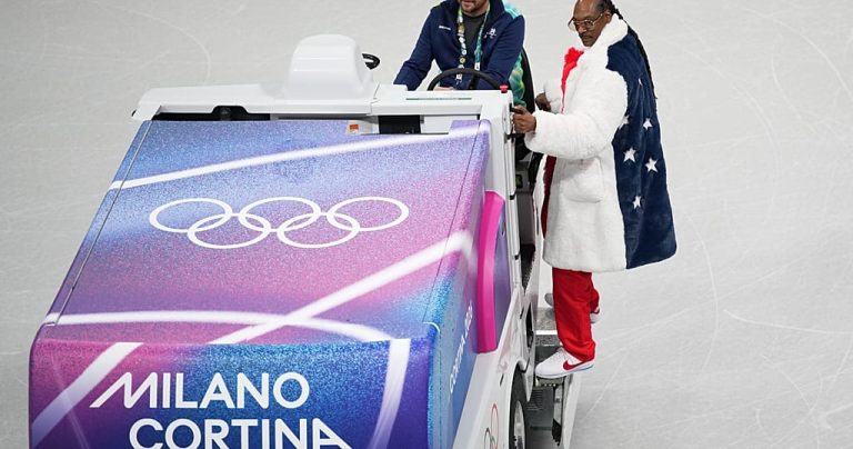 From stage to flame - Snoop Dogg joins Olympic torch relay